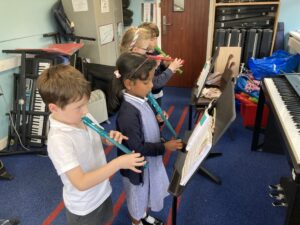 Children playing recorders